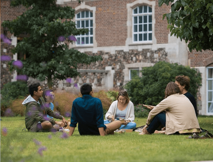 People sat on college grounds